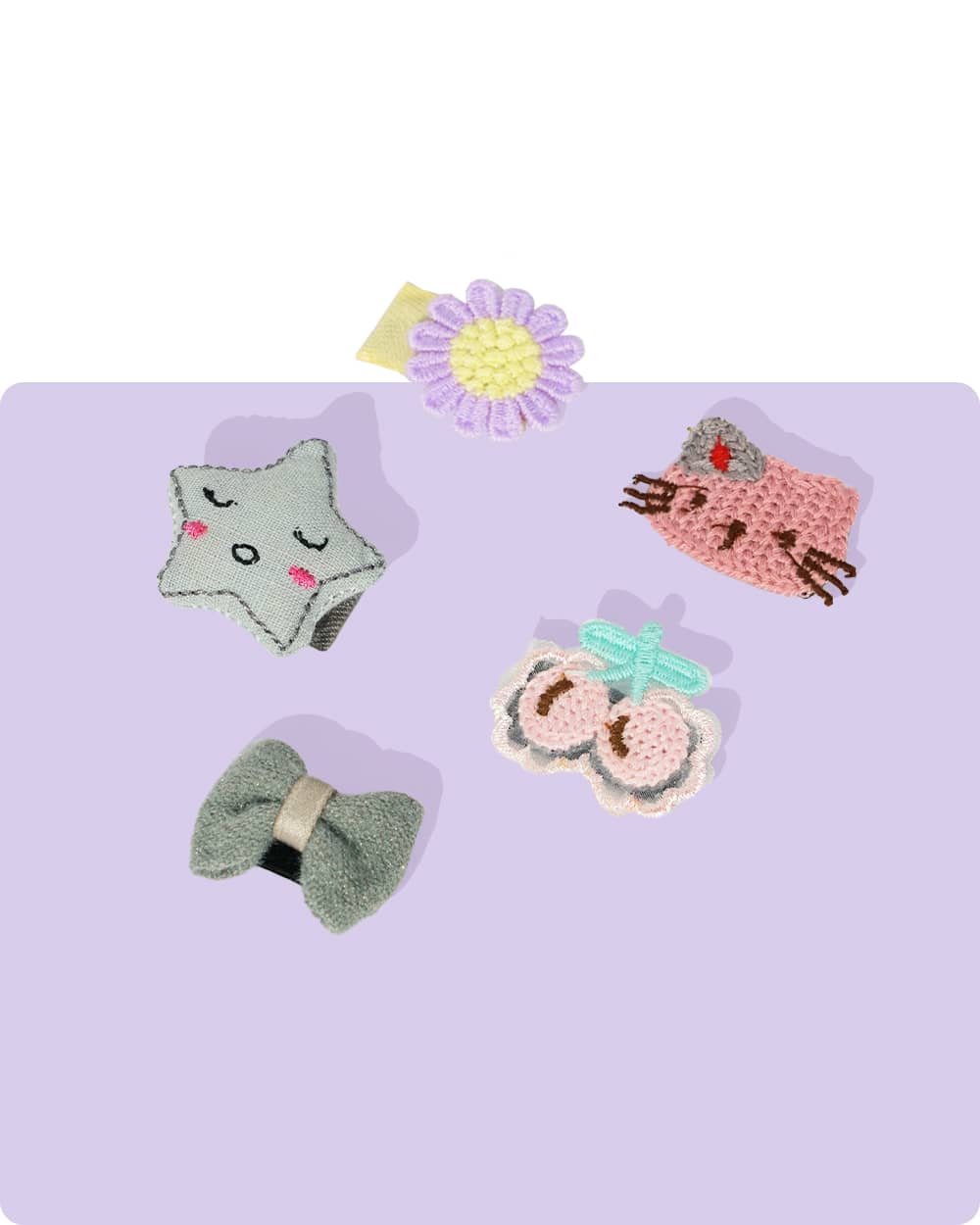 Assortment of cute cat-themed and floral hair clips and accessories - gray cat applique, pink crochet cat clip, gray bow clip, purple and yellow flower clip