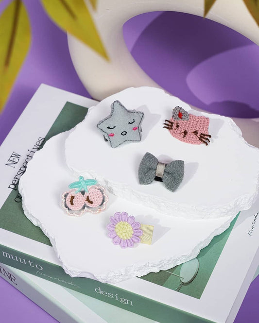 This set of Cute Cat and Floral Hair Clips offers a practical and stylish solution for pet owners, featuring a variety of playful designs that attach securely without irritating the skin.